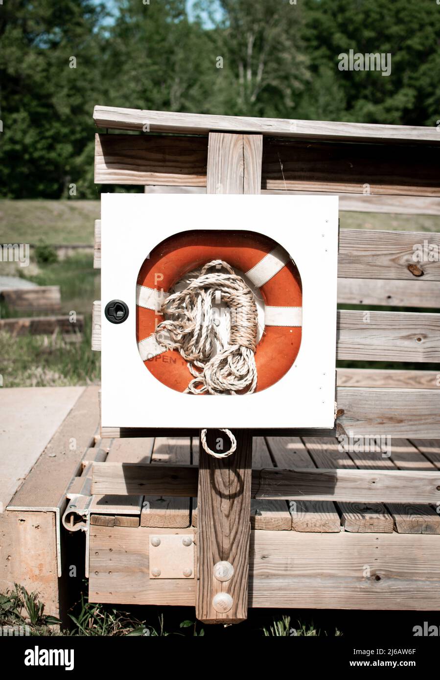 Life preserver on a dock at the lake Stock Photo