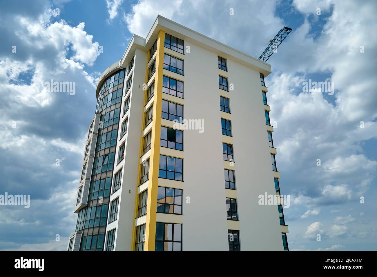 Architectural details of modern high apartment building facade with ...