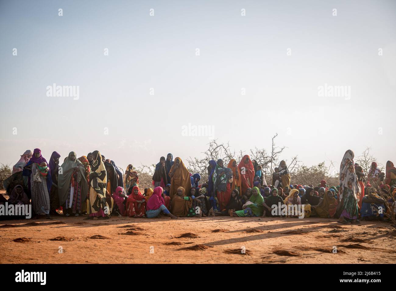 Nearly 300 people, mostly women and children, right after they arrived in Qansahley camp in Dollow, Jubaland, Somalia, after being displaced by drought. Stock Photo