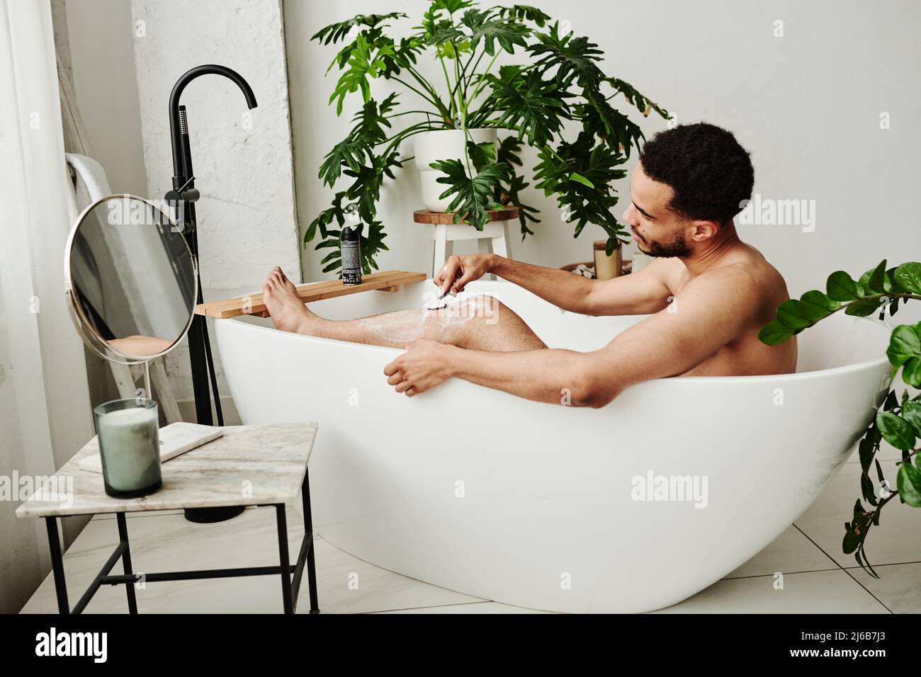 Male legs bath hi-res stock photography and images - Alamy