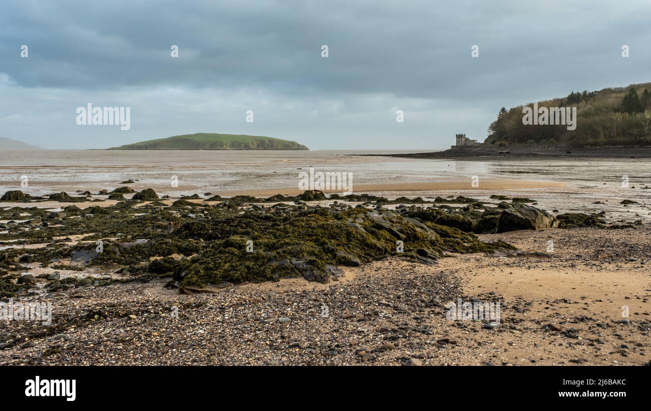 Low tide over Balcary Bay with Heston Island and Balcary Tower in the ...