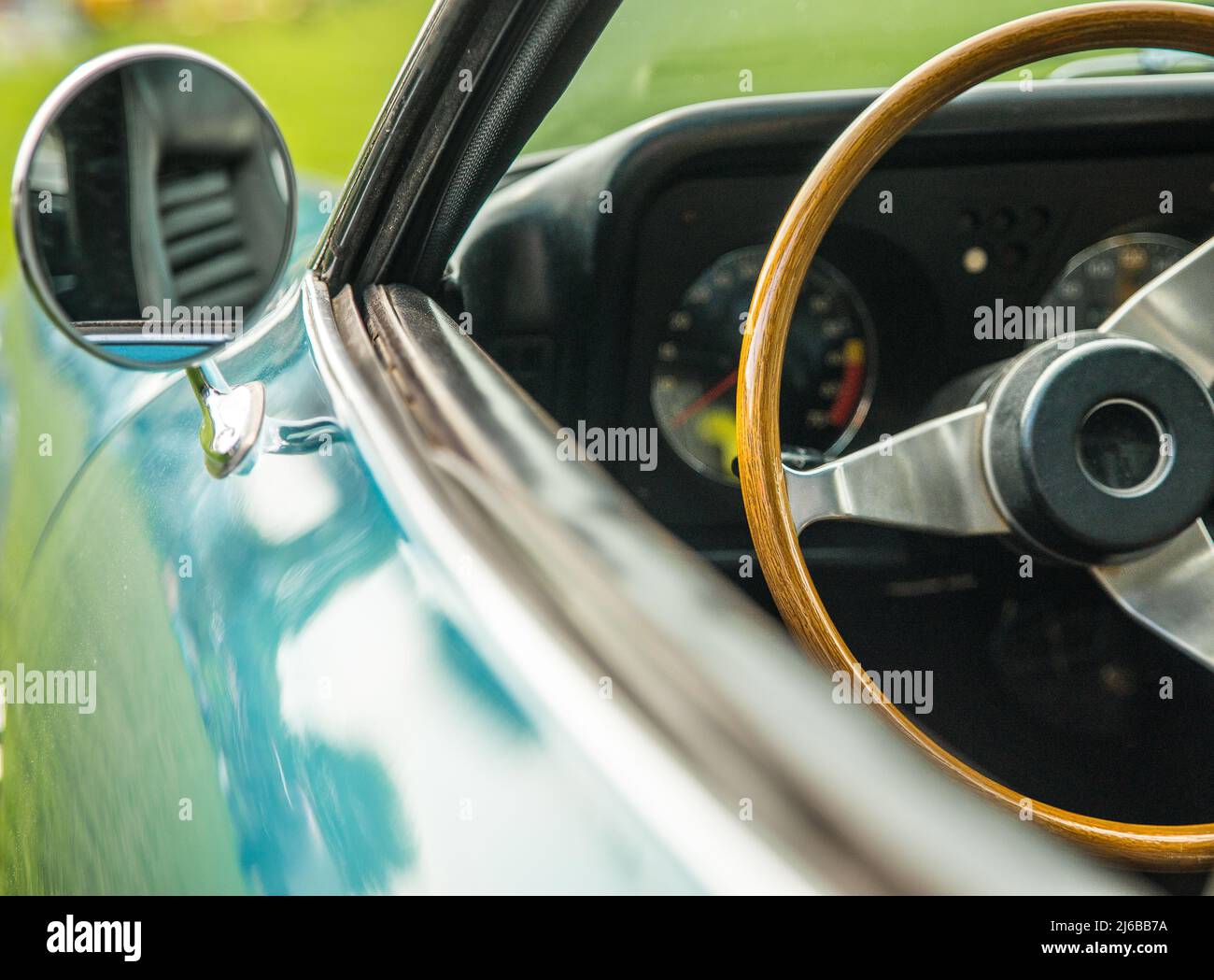 side view and mirrorof a classic car Stock Photo - Alamy