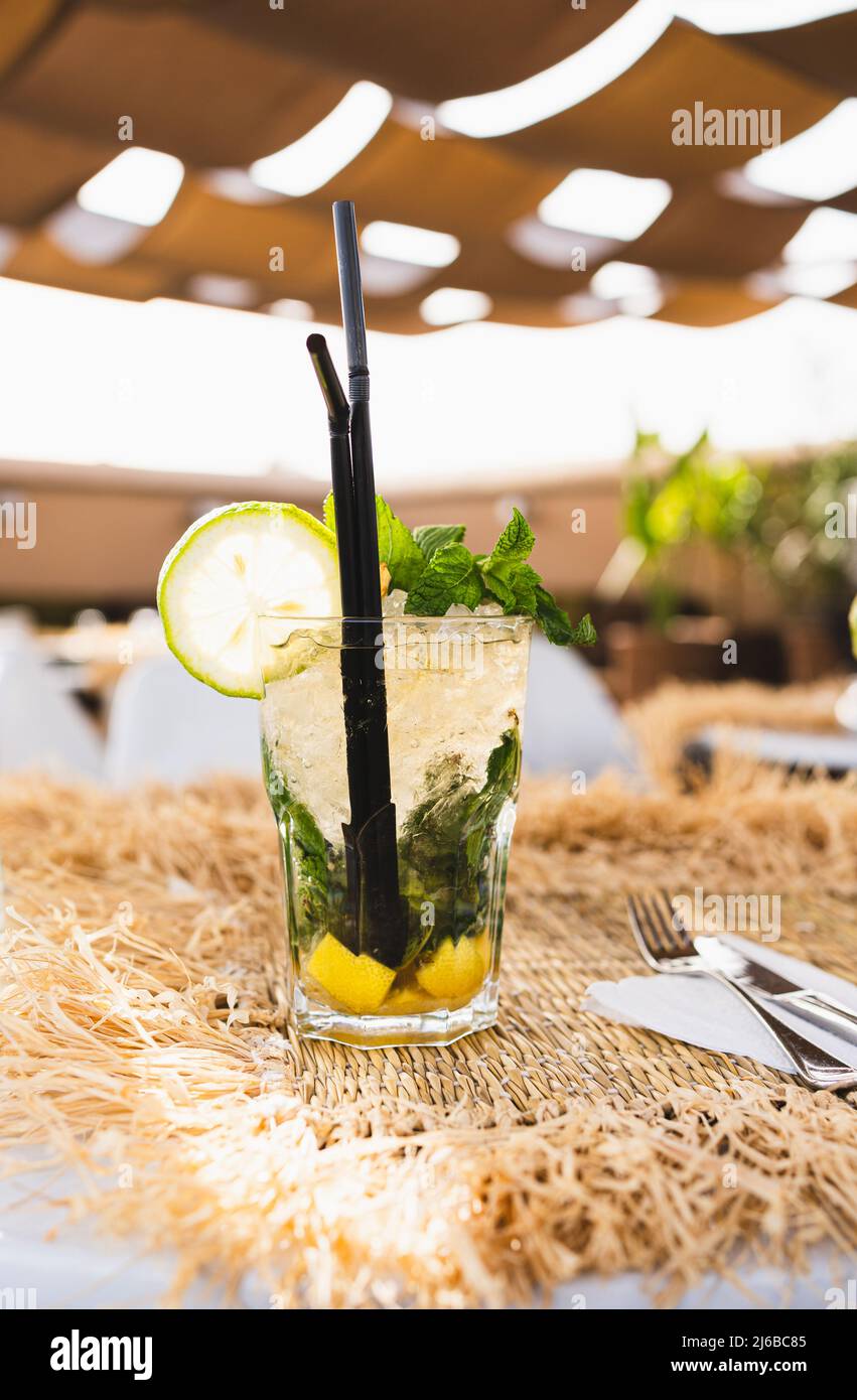 Mojito Cocktail in Glass Jars on Blue Water Background. Copy Space. Stock  Photo by annapustynnikova