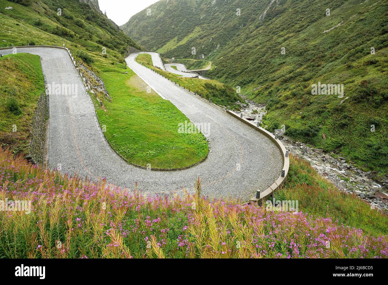 Road curves on the south side of the St. Gotthard Pass, Canton Ticino, Switzerland Stock Photo