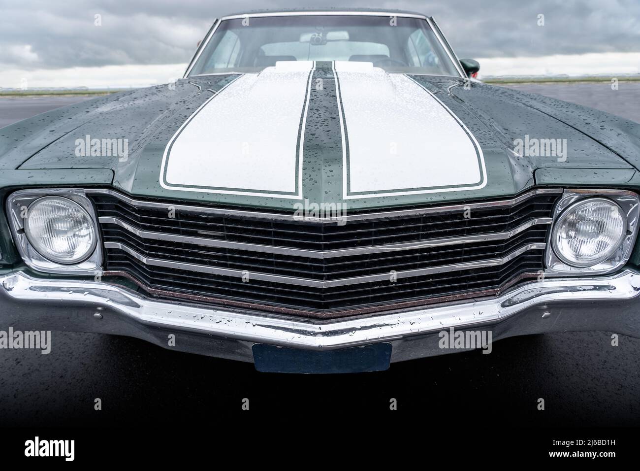 Front view of a classic american retro car. Clearly visible is the