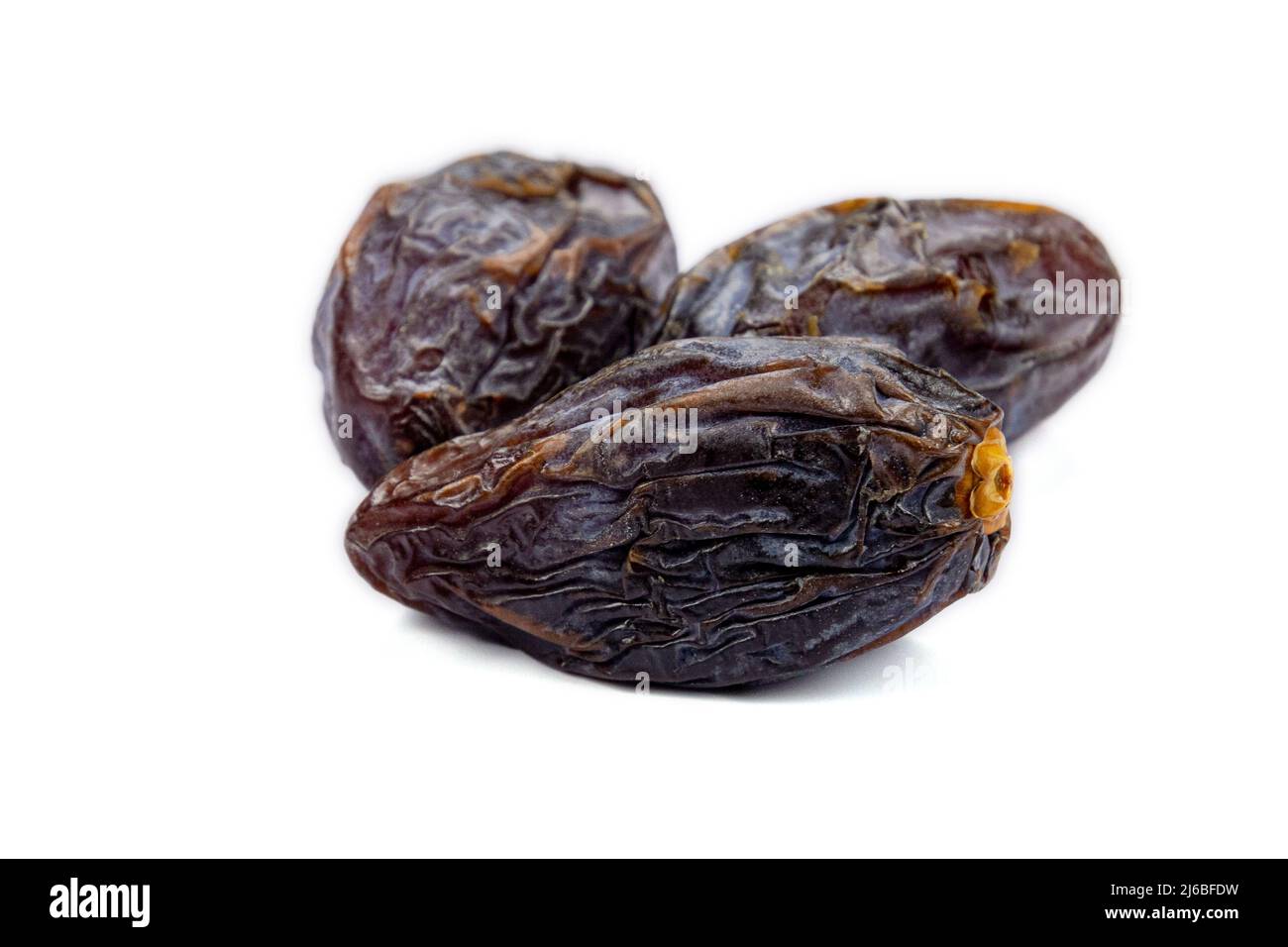 prunes isolated on a white background Stock Photo