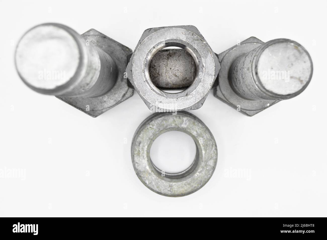 Galvanized steel metal with metric bolt nut and washer, isolated on