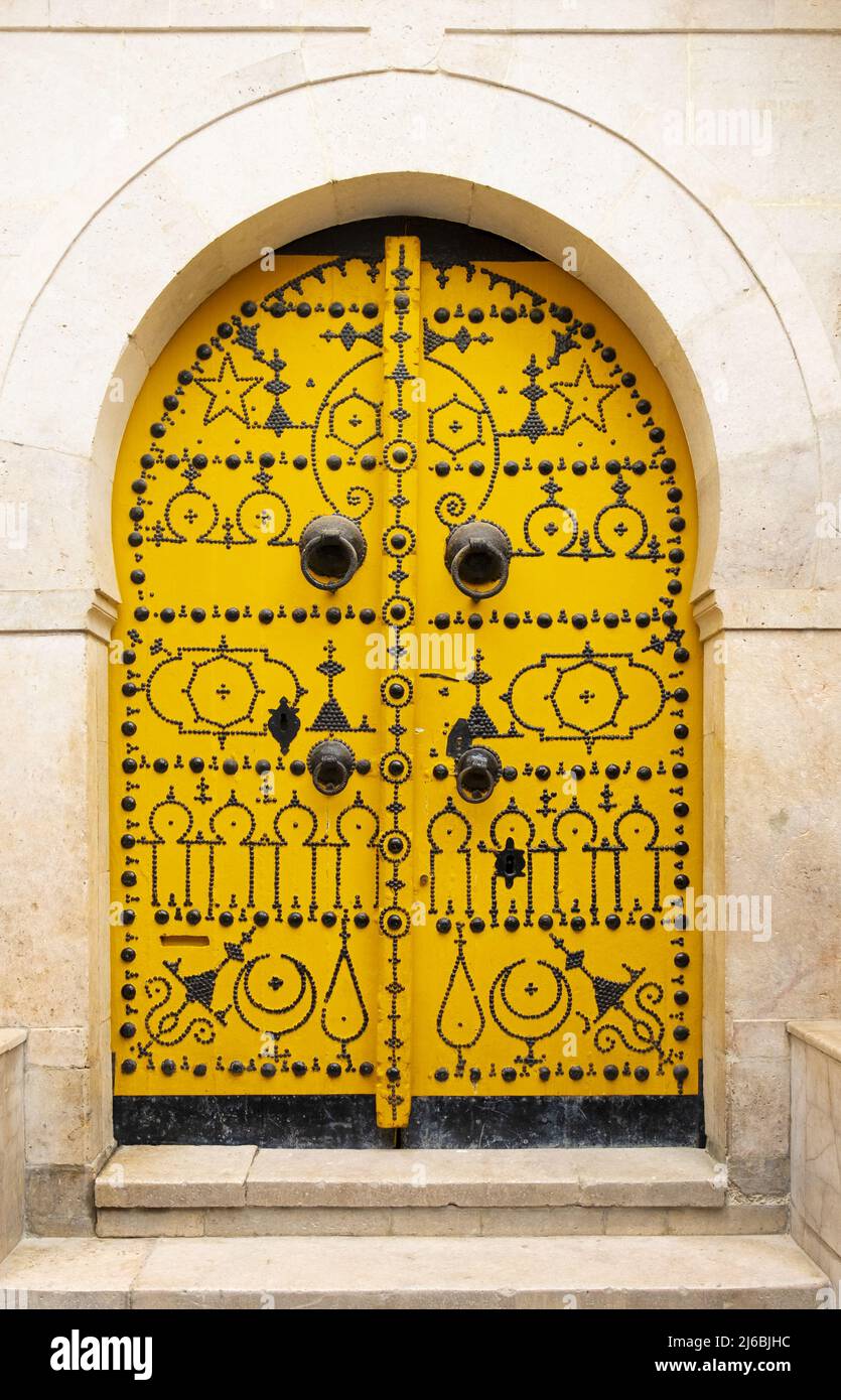 Typical yellow gate in Tunisia Stock Photo Alamy