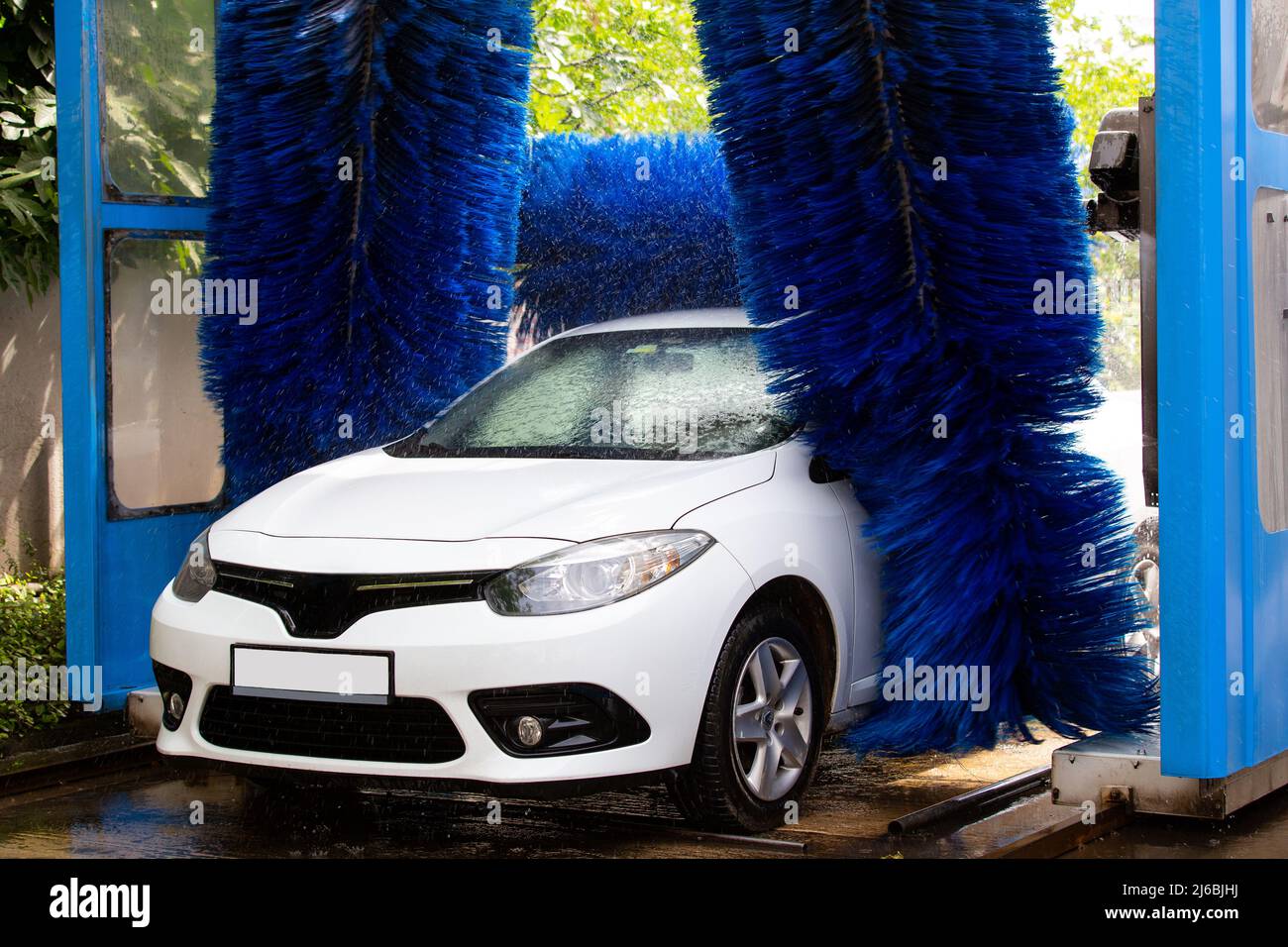 Washing the car in an automatic washing machine. Brushed Car Washing Machine Stock Photo Alamy