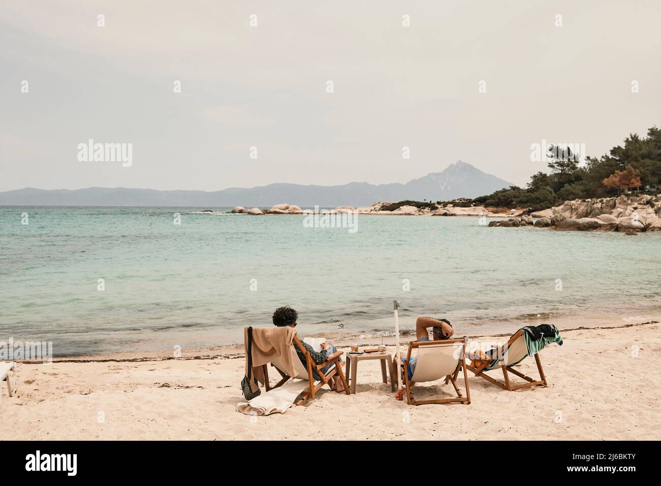Tourist sunbathing at kavourotripes chalkidiki Greece Stock Photo