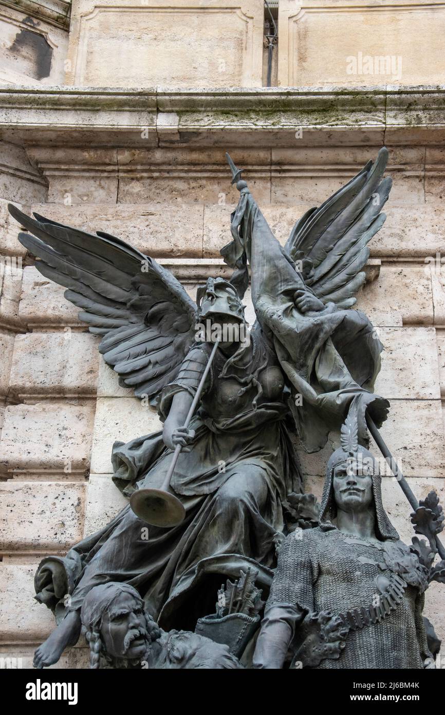 "War" The monumental allegorical bronze statues of War and Peace stand beside the entrance to