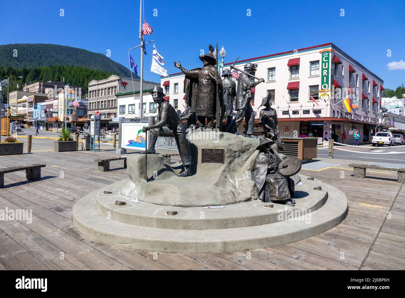 The Rock Bronze Statue In Ketchikan Alaska, Depicting The History Of People In The Early Years Of Ketchikan Alaska Stock Photo