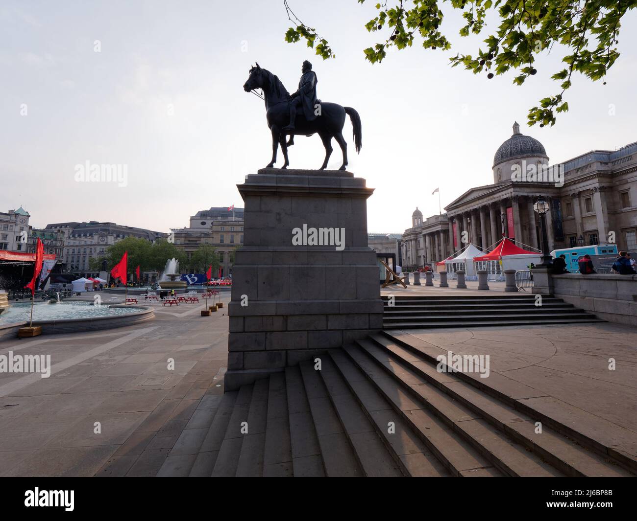 Empty Trafalgar Square after St Georges day celebrations have finished with the Equestrian Statue centre. Stock Photo