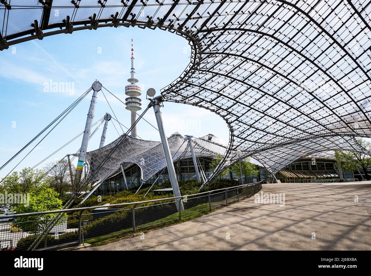 The famous roof of the Munich Olympic stadium designed by Behnisch and Frei Otto – Olympiapark und olympische Sportstätten in München Stock Photo