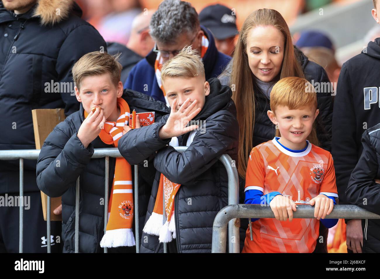 Blackpool fans attending the game Stock Photo - Alamy