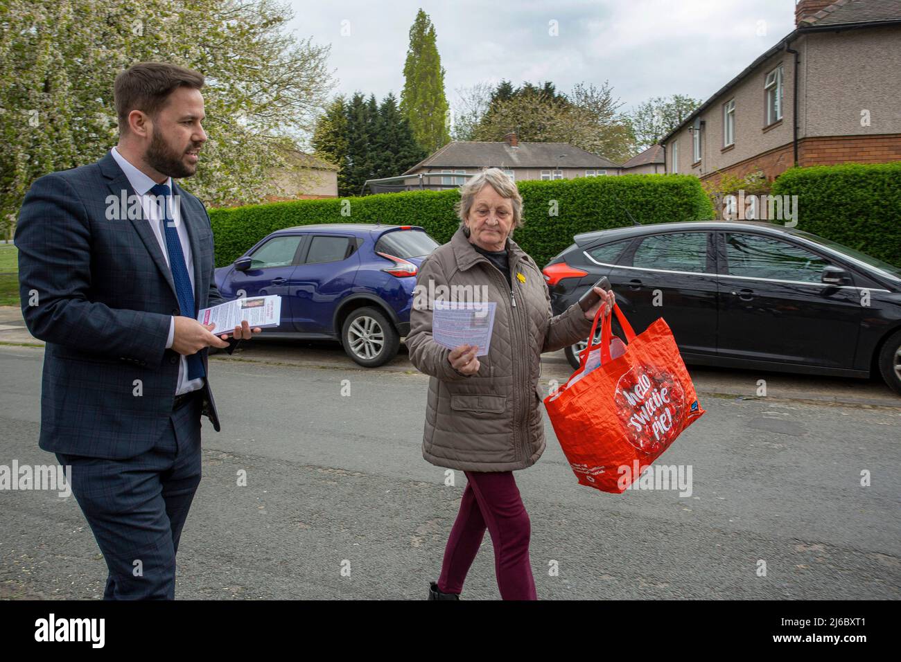 Michael Graham, Labour councillor for West  Wakefield, on a campaign trail of canvassing in a  deprived  area in Wakefield , West Yorkshire, England.© Stock Photo