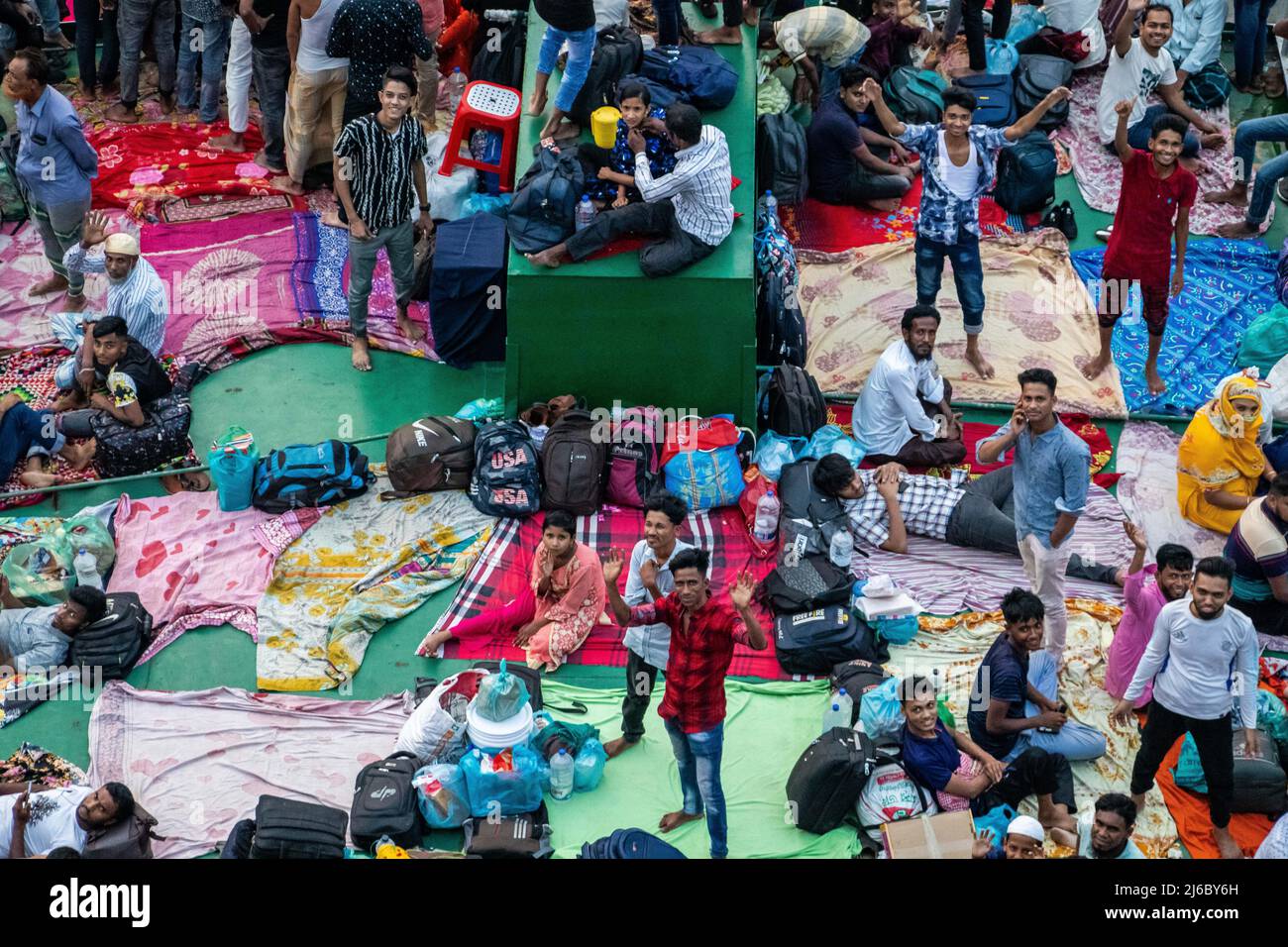 Eid-Ul-Fitr Journey by launch during the end time of the holy month of Ramadan after two years of Covid times. This image has been captured from Posto Stock Photo