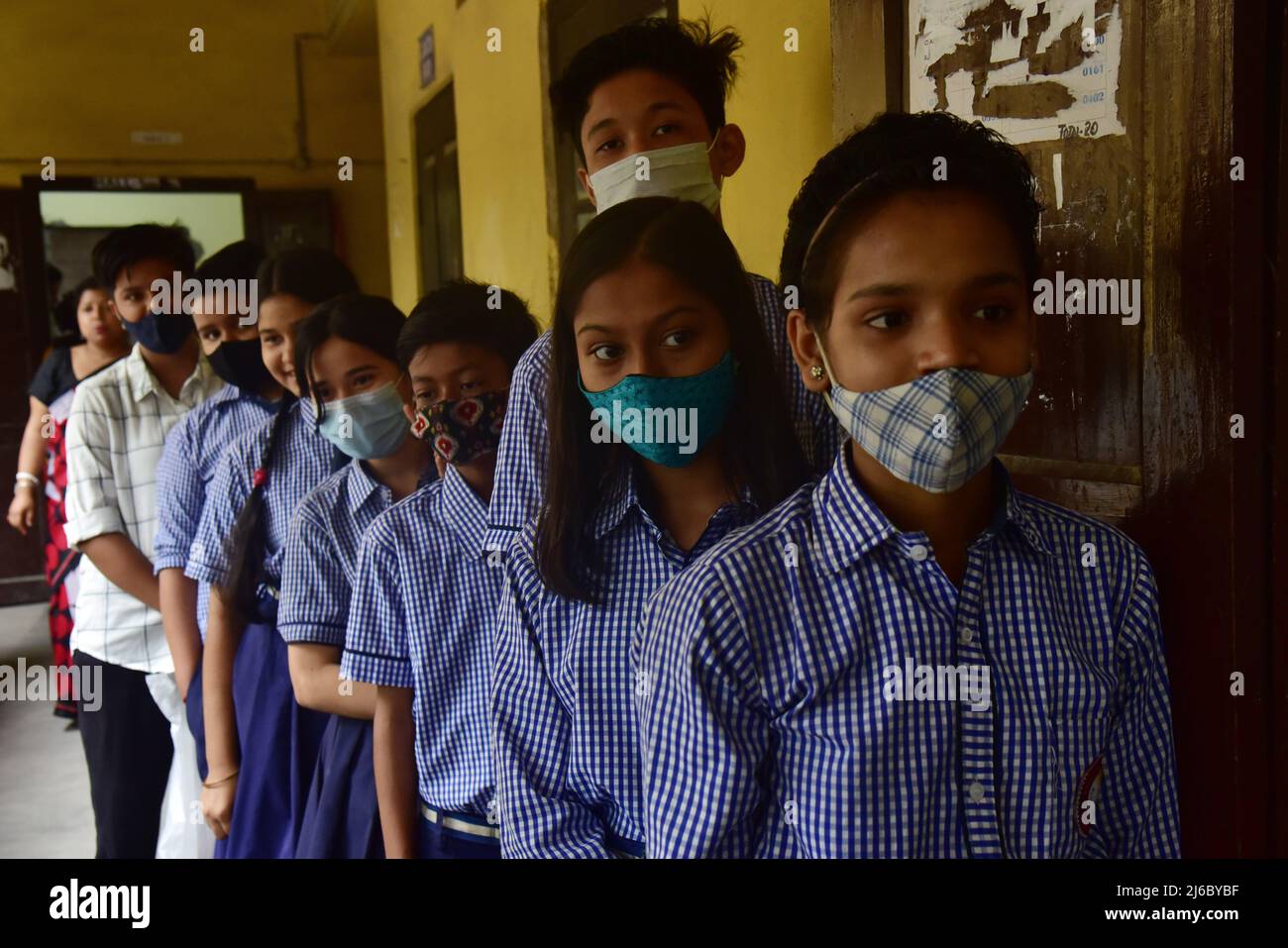 April 30, 2022, Guwahati, Guwahati, India: Students of age group 12 to 14  years old wait to receive COVID-19 injection at Angelica Higher Secondary  School in Guwahati Assam India on Saturday 30th
