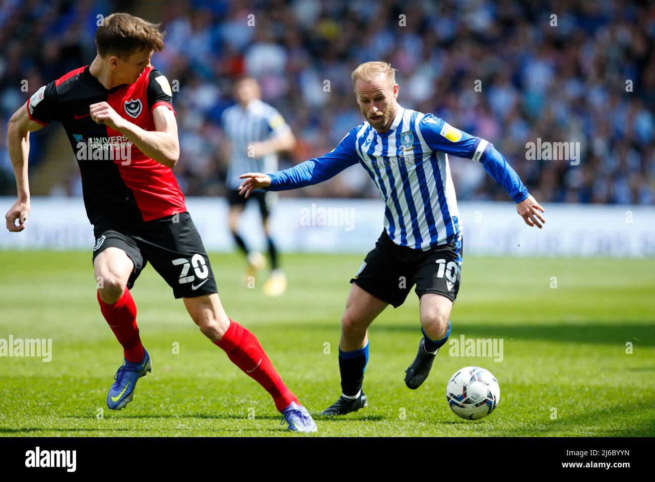 Barry Bannan #10 of Sheffield Wednesday and Sean Raggett #20 of ...