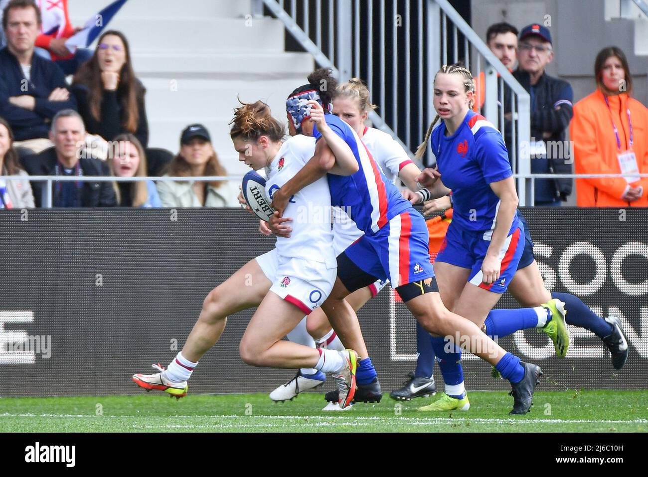 England's Lydia Thompson is tackled during the TikTok Women's Six Nations match at the Stade Jean Dauger in Beyonne, France. Picture date: Saturday April 30, 2022. Stock Photo