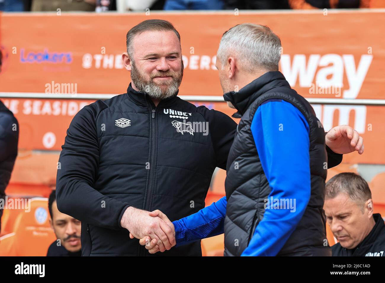 Neil Critchley head coach of Blackpool Wayne Rooney manager of