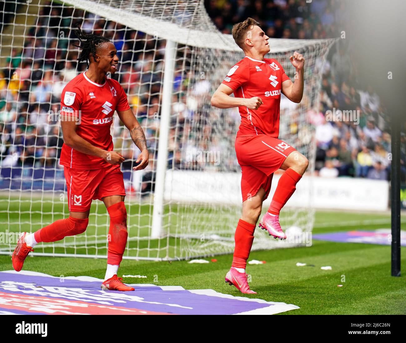 Milton Keynes Dons' Scott Twine celebrates his third goal during the