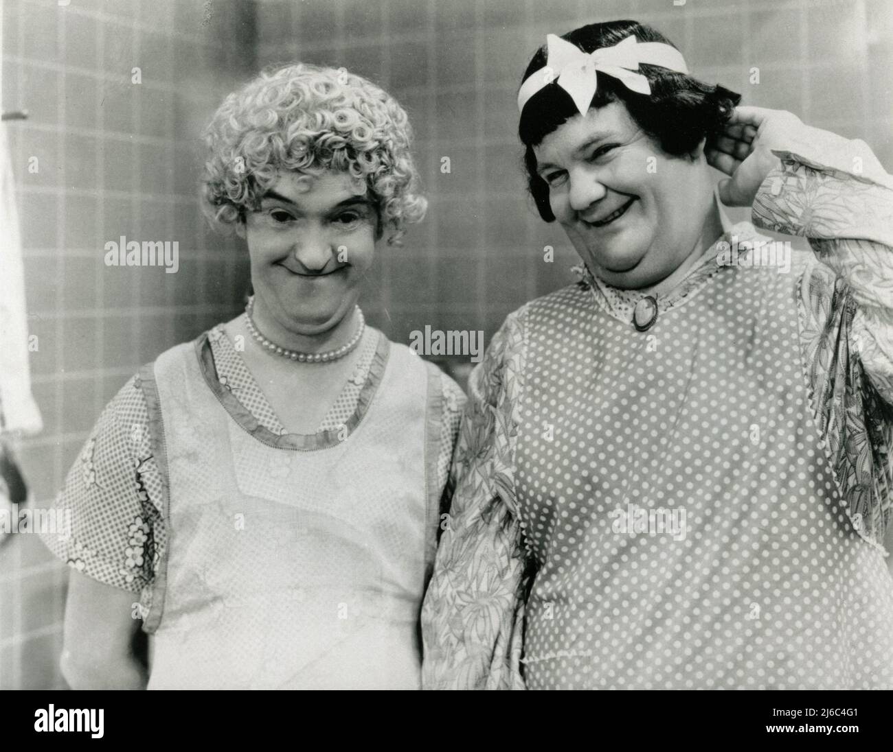 Comedy duo English actor Stan Laurel and American actor Oliver Hardy in the movie Twice Two, USA 1933 Stock Photo