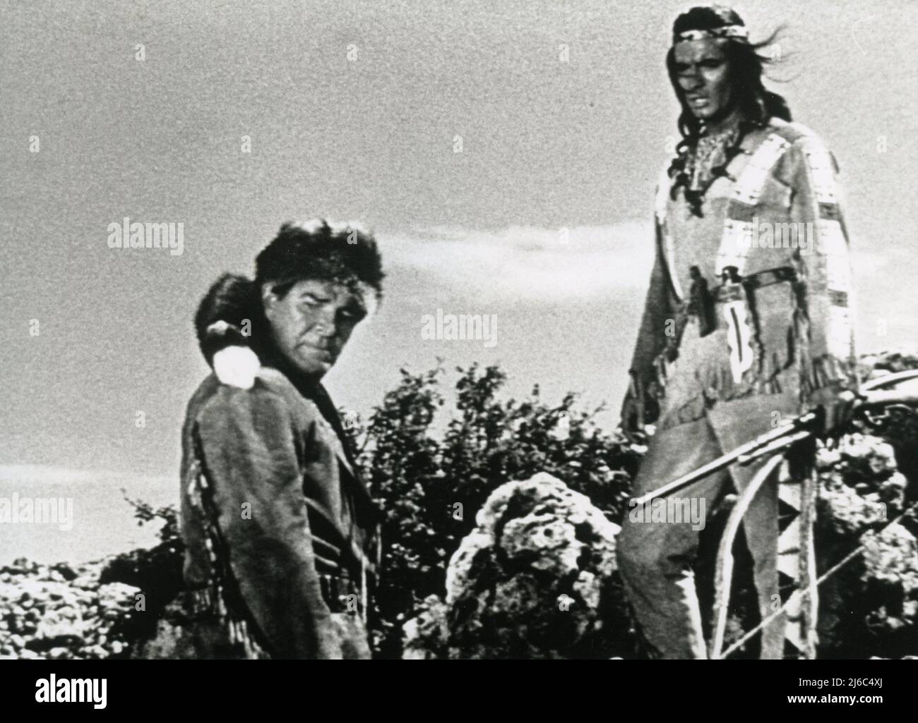 French actor Pierre Brice (right) and actor Rod Cameron in the movie Winnetou: Thunder at the Border, Germany 1966 Stock Photo