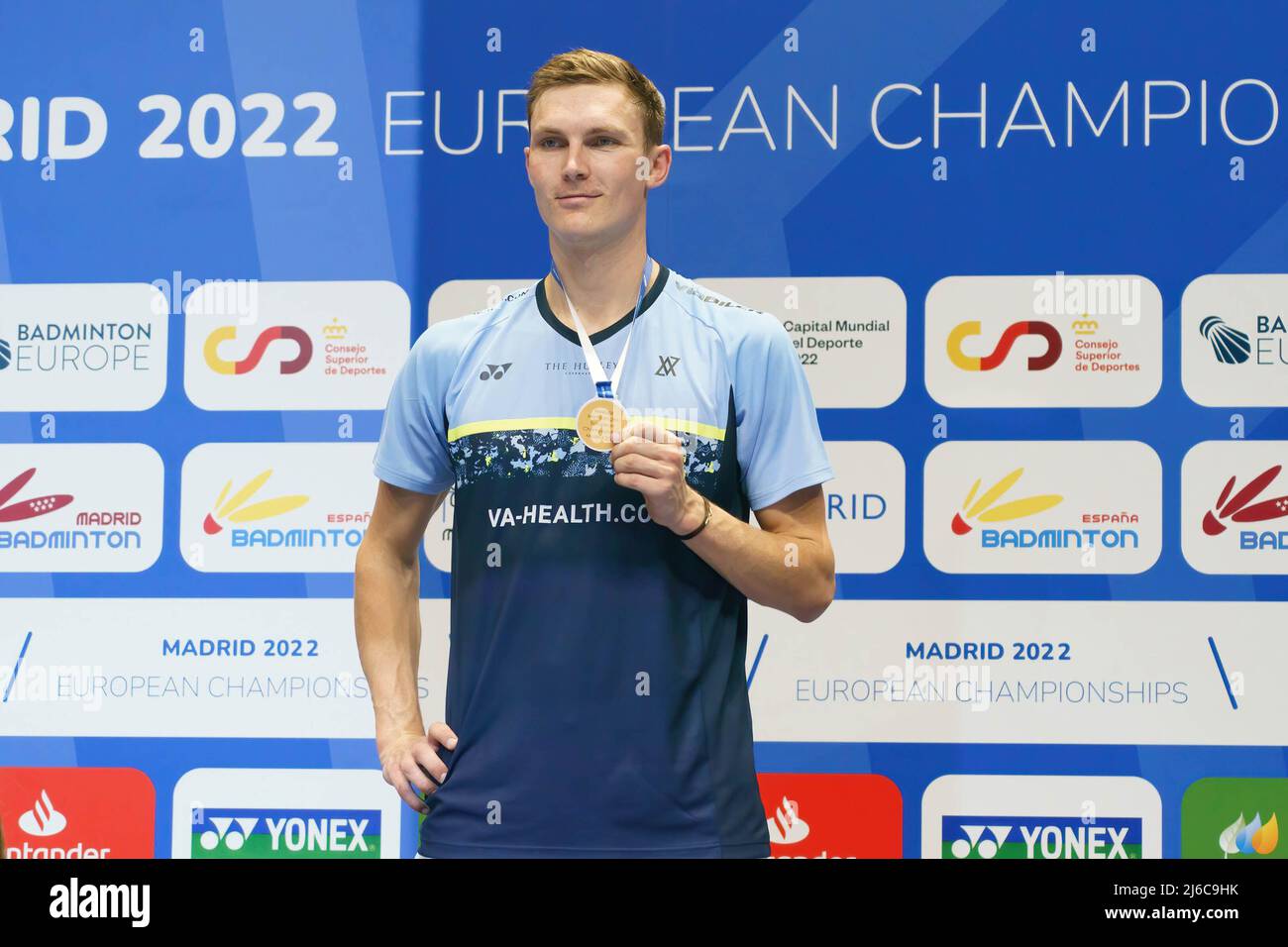 Danish player, Viktor Axelsen poses with his gold medal after winning the  men's singles final of the European Badminton Championship, which he played  against Anders Antonsen (21-17 and 21-15) at the Gallur