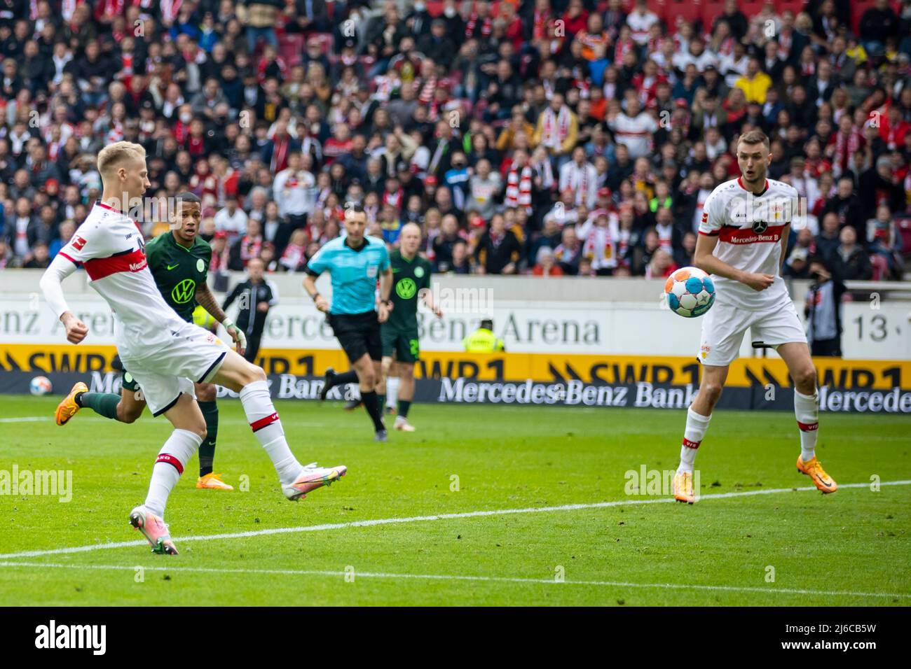 30 April 2022, Baden-Wuerttemberg, Stuttgart: Soccer: Bundesliga, VfB Stuttgart - VfL Wolfsburg, Matchday 32, Mercedes-Benz Arena. Stuttgart's Chris Führich (l) scores the goal to make it 1:1. Photo: Tom Weller/dpa - IMPORTANT NOTE: In accordance with the requirements of the DFL Deutsche Fußball Liga and the DFB Deutscher Fußball-Bund, it is prohibited to use or have used photographs taken in the stadium and/or of the match in the form of sequence pictures and/or video-like photo series. Stock Photo