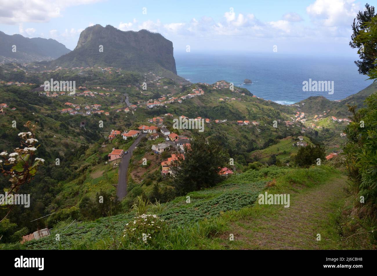 The hill of Penha de Aguia at Porto da Cruz on the north coast of the island of Madeira, Portugal.  Viewed from Cruz da Guarda. Stock Photo