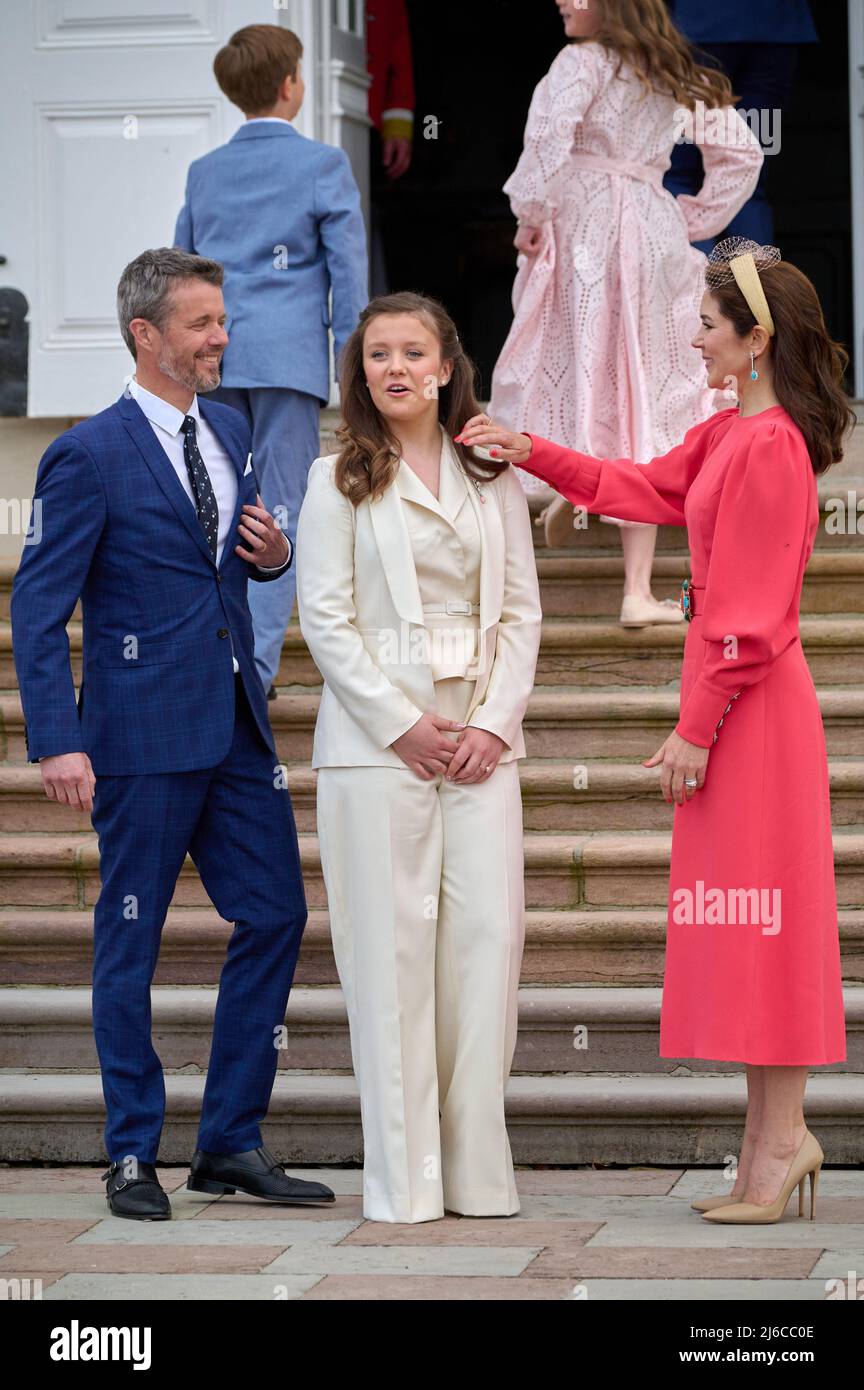 Princess Isabella of Denmark is confirmed . The confirmation will take place in Fredensborg Castle Church by the Royal Confessor, Bishop Henrik Wigh-Poulsen. PICTURE:Princess Isabella with mother and father,Crownprince Frederik and Crownprincess Mary of Denmark. Fredensborg, Denmark, on April 30, 2022. Photo by Stefan Lindblom/Stella Pictures/ABACAPRESS.COM Stock Photo