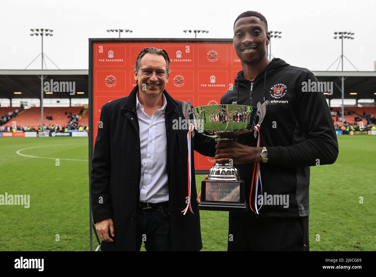 Simon Sadler owner of Blackpool presents the player of the year trophy