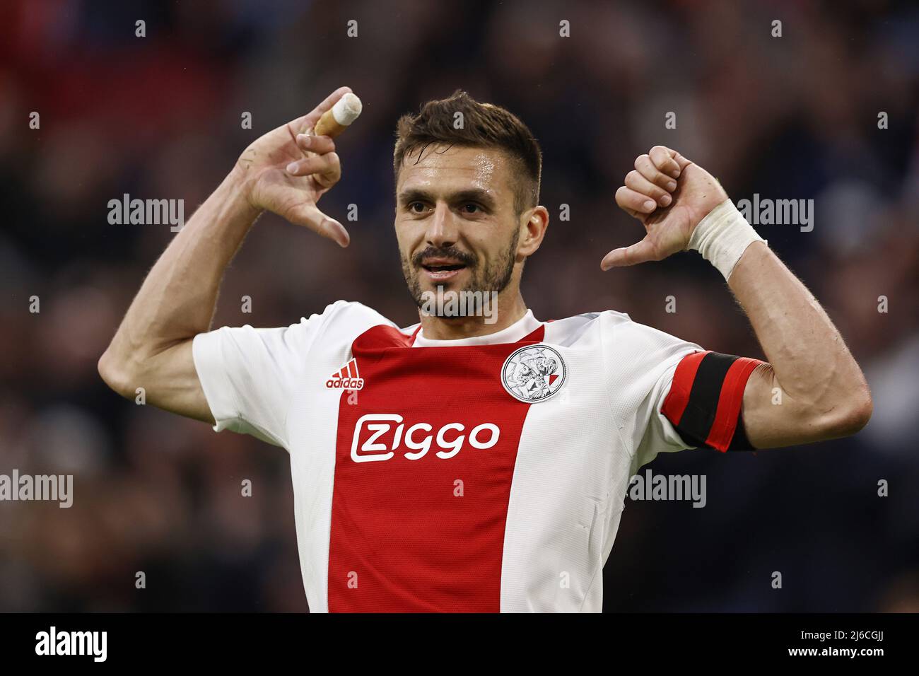 AMSTERDAM - Dusan Tadic of Ajax celebrates the 1-0 during the Dutch  Eredivisie match between Ajax Amsterdam and PEC Zwolle at the Johan Cruijff  ArenA on April 30, 2022 in Amsterdam, Netherlands.