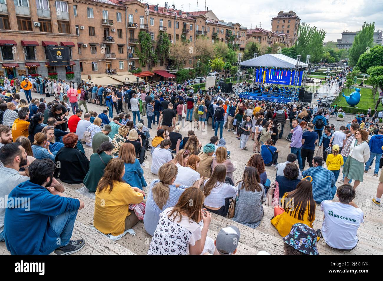 Yerevan, Armenia - April 30, 2022 - People gather around at Cascade Complex to listen to the Jazz Festival in Yerevan, Armenia Stock Photo