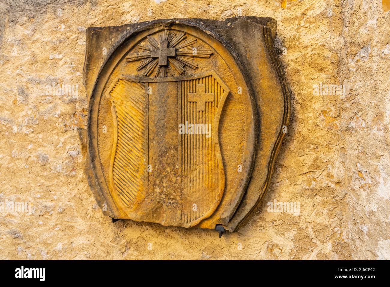 The coat of arms of Neuenburg carved in a stone. Stock Photo