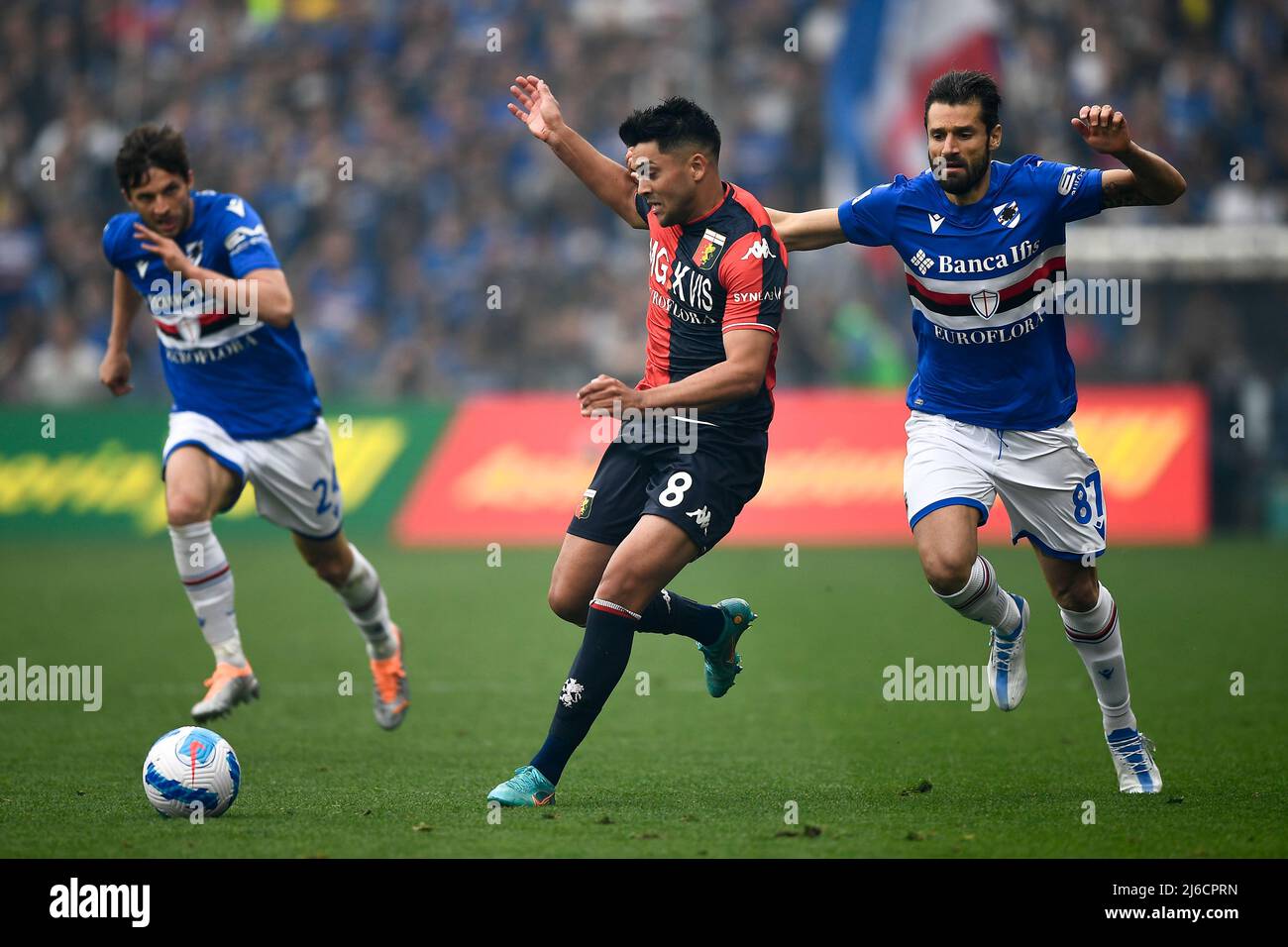 Genoa, Italy. 30 April 2022. Antonio Candreva of UC Sampdoria fouls Nadiem  Amiri of Genoa CFC during the Serie A football match between UC Sampdoria  and Genoa CFC. Credit: Nicolò Campo/Alamy Live