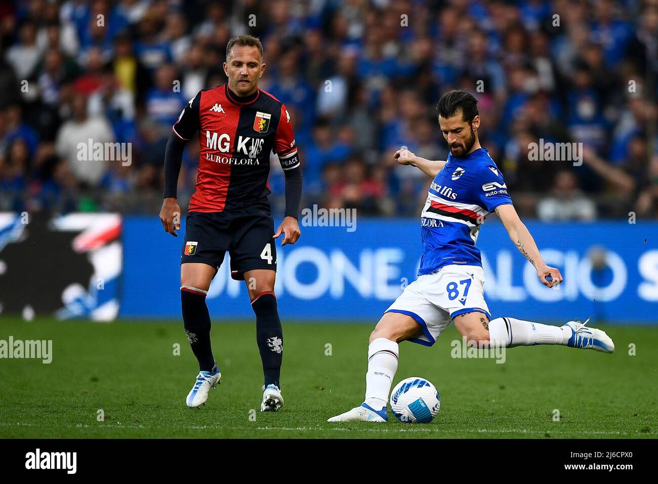 Genoa, Italy. 30 April 2022. Antonio Candreva of UC Sampdoria competes for  the ball with Pablo Galdames of Genoa CFC during the Serie A football match  between UC Sampdoria and Genoa CFC.