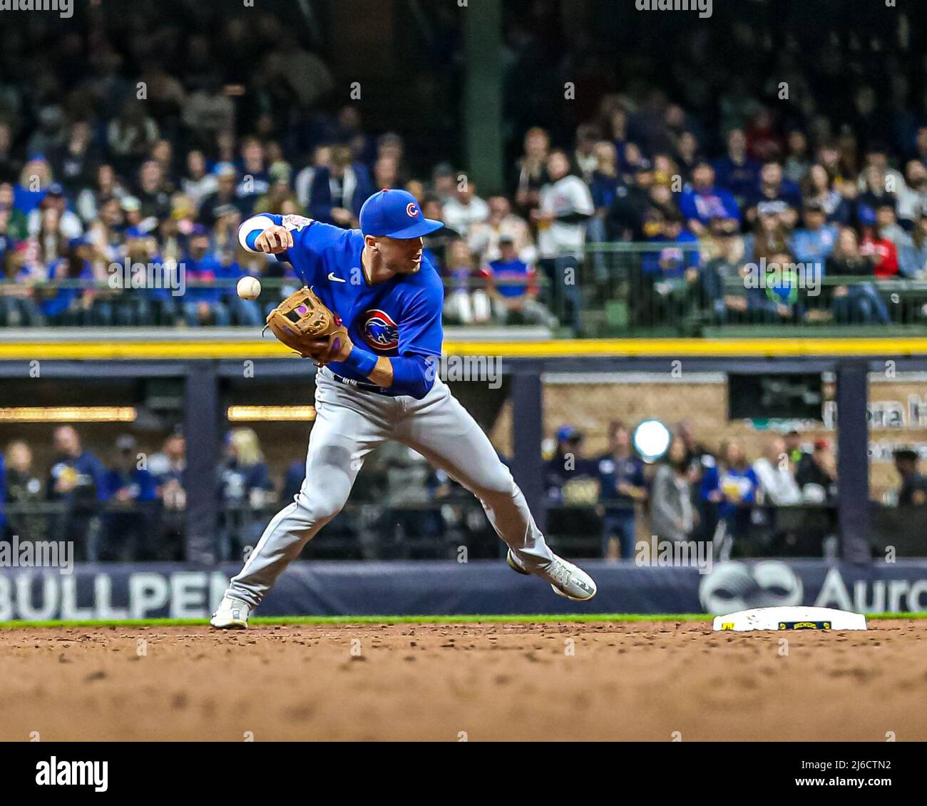 April 29, 2022 - Chicago Cubs shortstop Nico Hoerner (2) has the ball pop  out his glove during MLB Baseball action between Chicago and Milwaukee at  Miller Park in Milwaukee, WI Stock Photo - Alamy