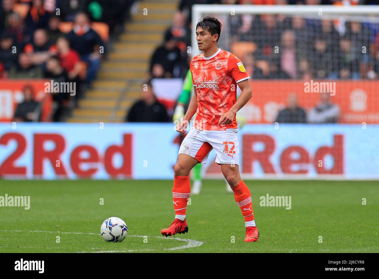 Kenny Dougall 12 of Blackpool controls the ball Stock Photo Alamy