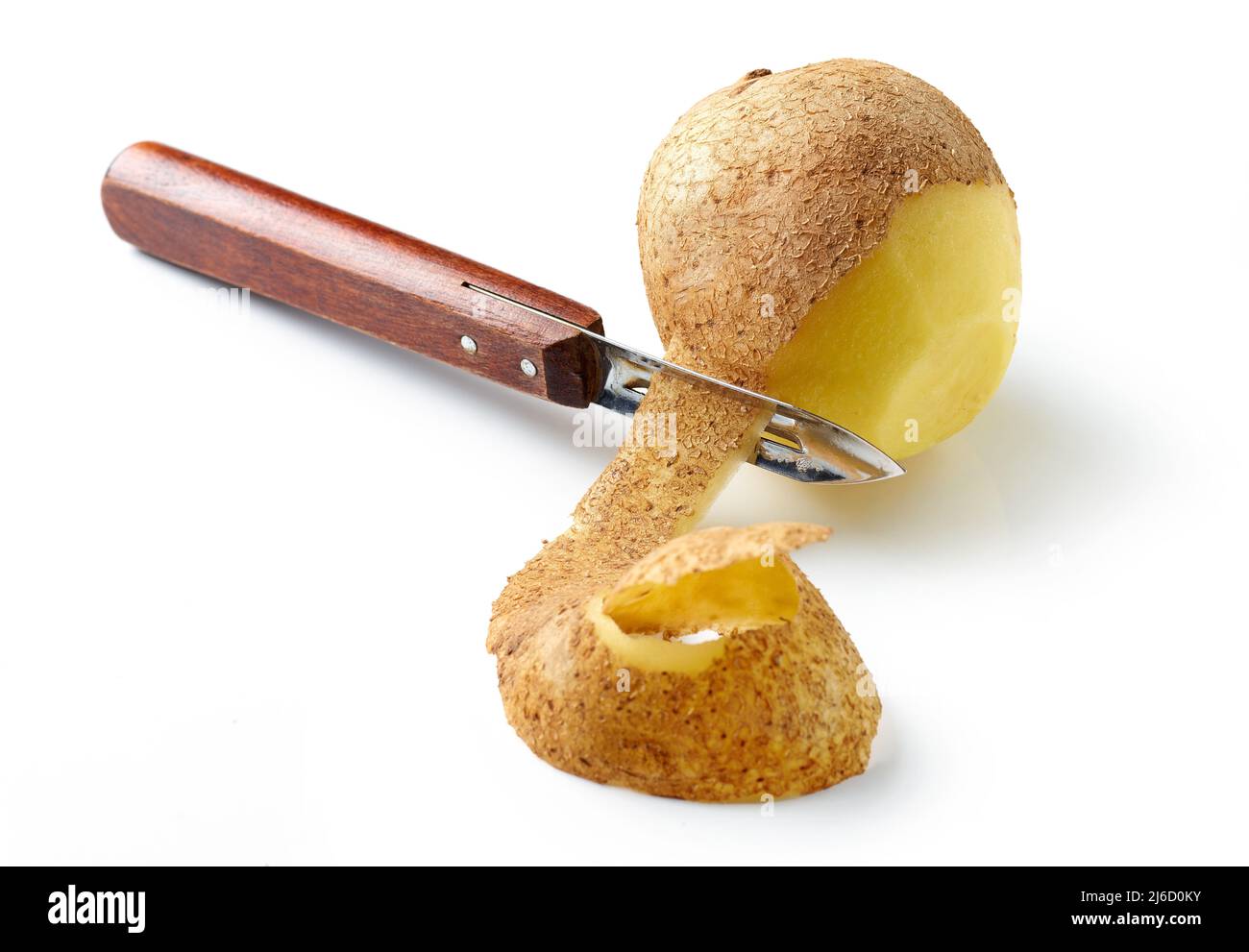 peeling potato isolated on white background Stock Photo