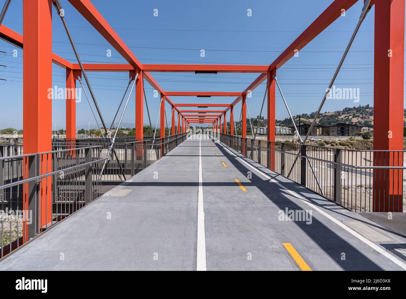 View of the new Taylor Yard bike path bridge spanning the Los Angeles River between Elysian Valley - Frog Town and Cypress Park in Los Angeles. Stock Photo