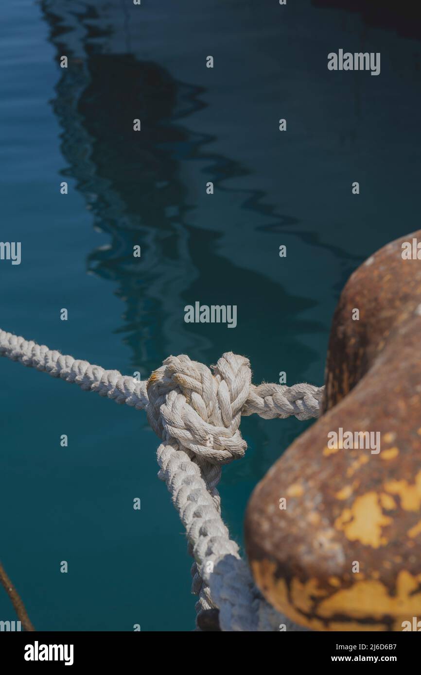 Ship rope holding or mooring it at the dock Stock Photo - Alamy
