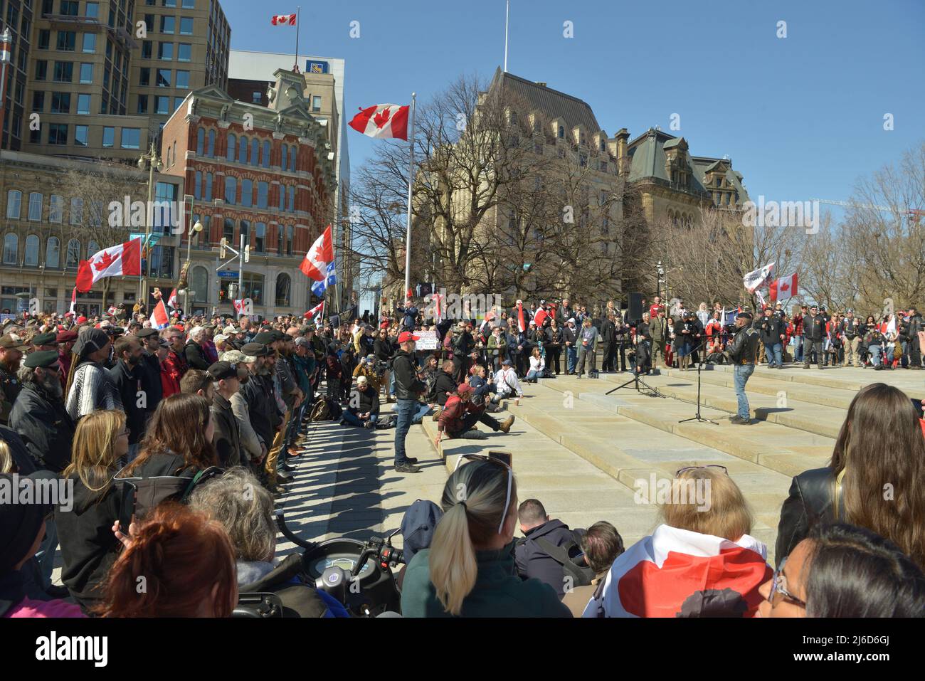Saturday, April 30, 2022, Ottawa Canada. The “Live From The Shed”, “Freedom Fighters Canada” and “Veterans For Freedom” -- “Rolling Thunder Convoy” -- Memorial Event/ Protest.  Veterans from these groups gave impassioned speeches and laid at a ceremonial wreath at the foot of The National War Memorial before a sizeable crowd, this followed by an indeed, thunderous parade of motorcycles doing a pass-by on Elgin Street just south of The Memorial. Many Ottawa and Ontario Provincial Police Services Members were also on hand to protect public safety. Stock Photo