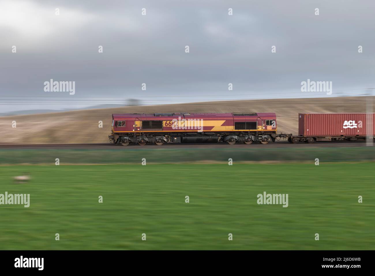 DB Cargo Rail UK class 66 diesel 66112 hauling a container