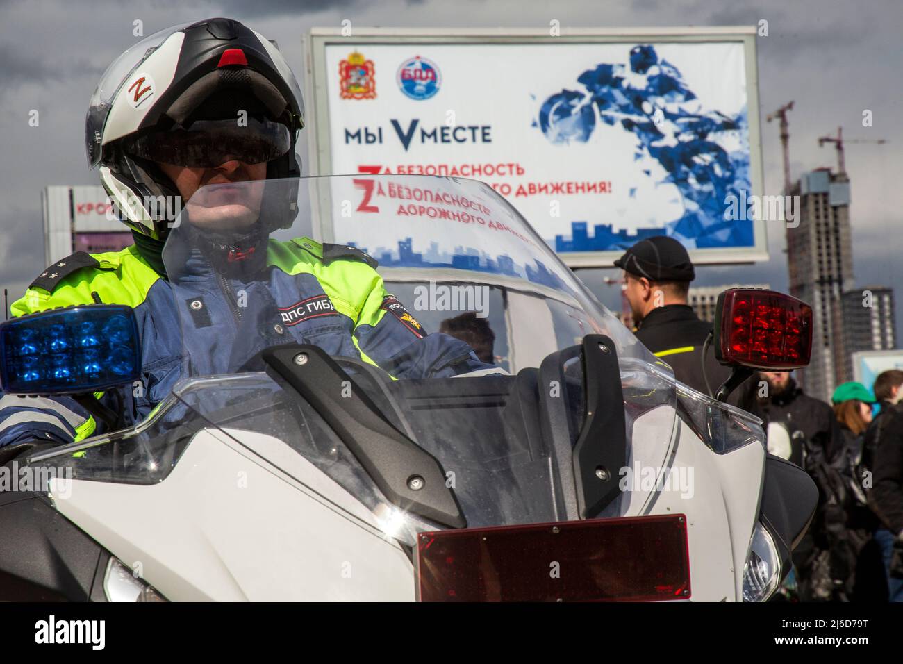 Police officer on a motorcycle patrol the street in Moscow, Russia Stock Photo
