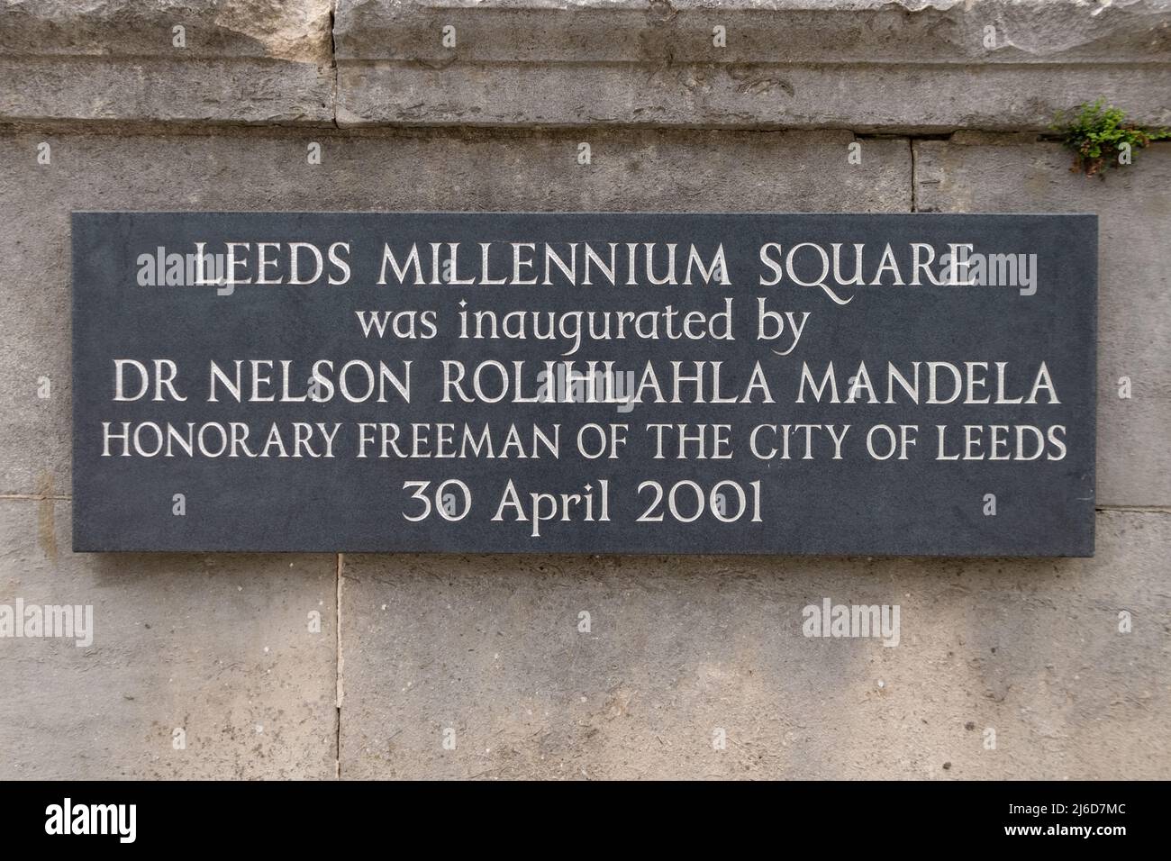 Leeds Millennium Square was inaugurated by Dr Nelson Rolihlahla Mandela Honarary freeman of the city of Leeds 30 April 2001 sign, Leeds, UK Stock Photo