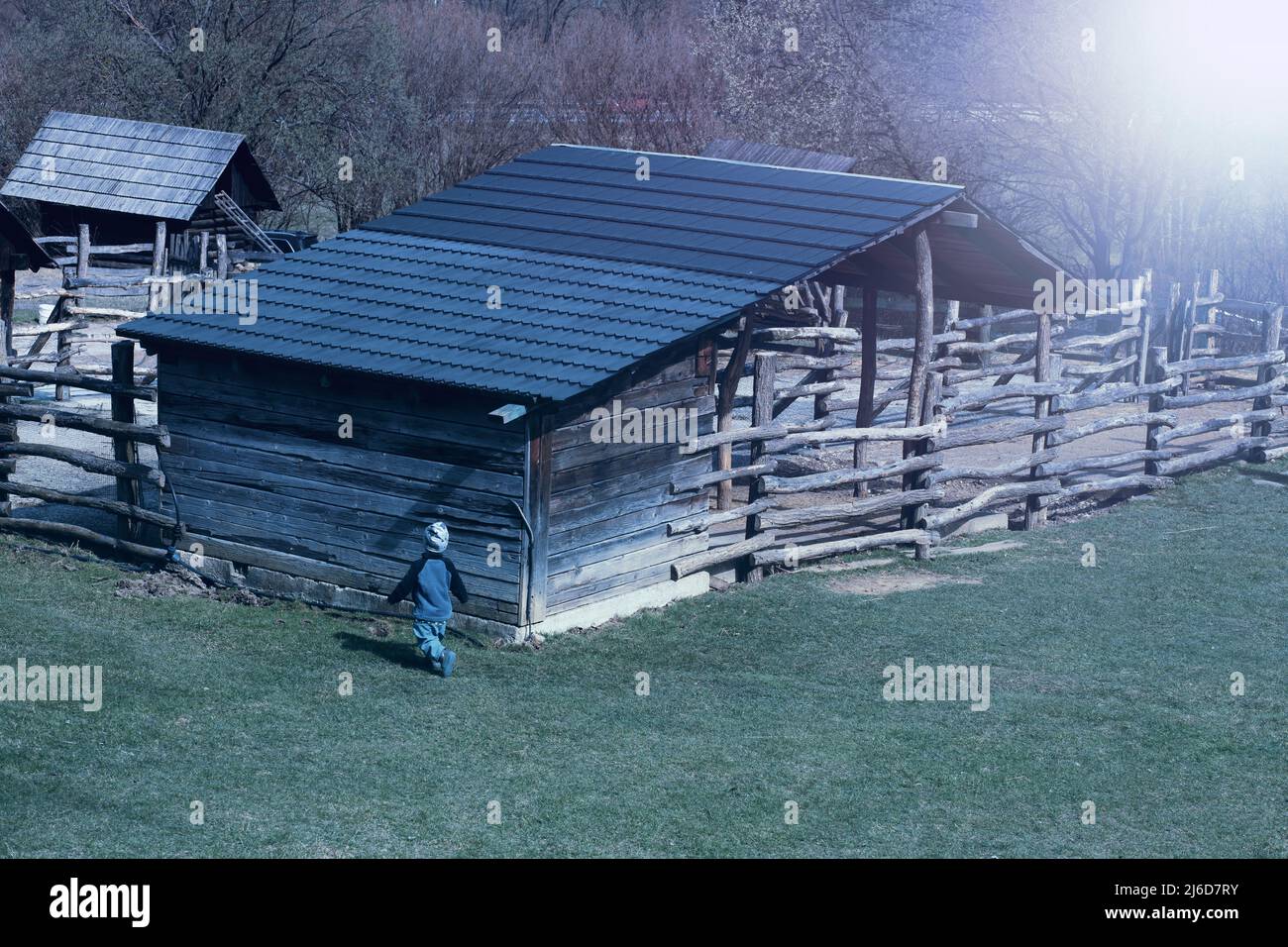 Wooden barn on animal farm.Spring season. Stock Photo