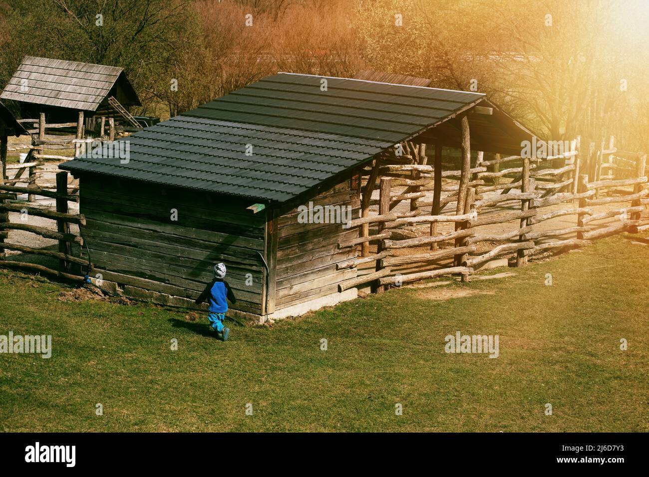 Wooden barn on animal farm.Spring season. Stock Photo