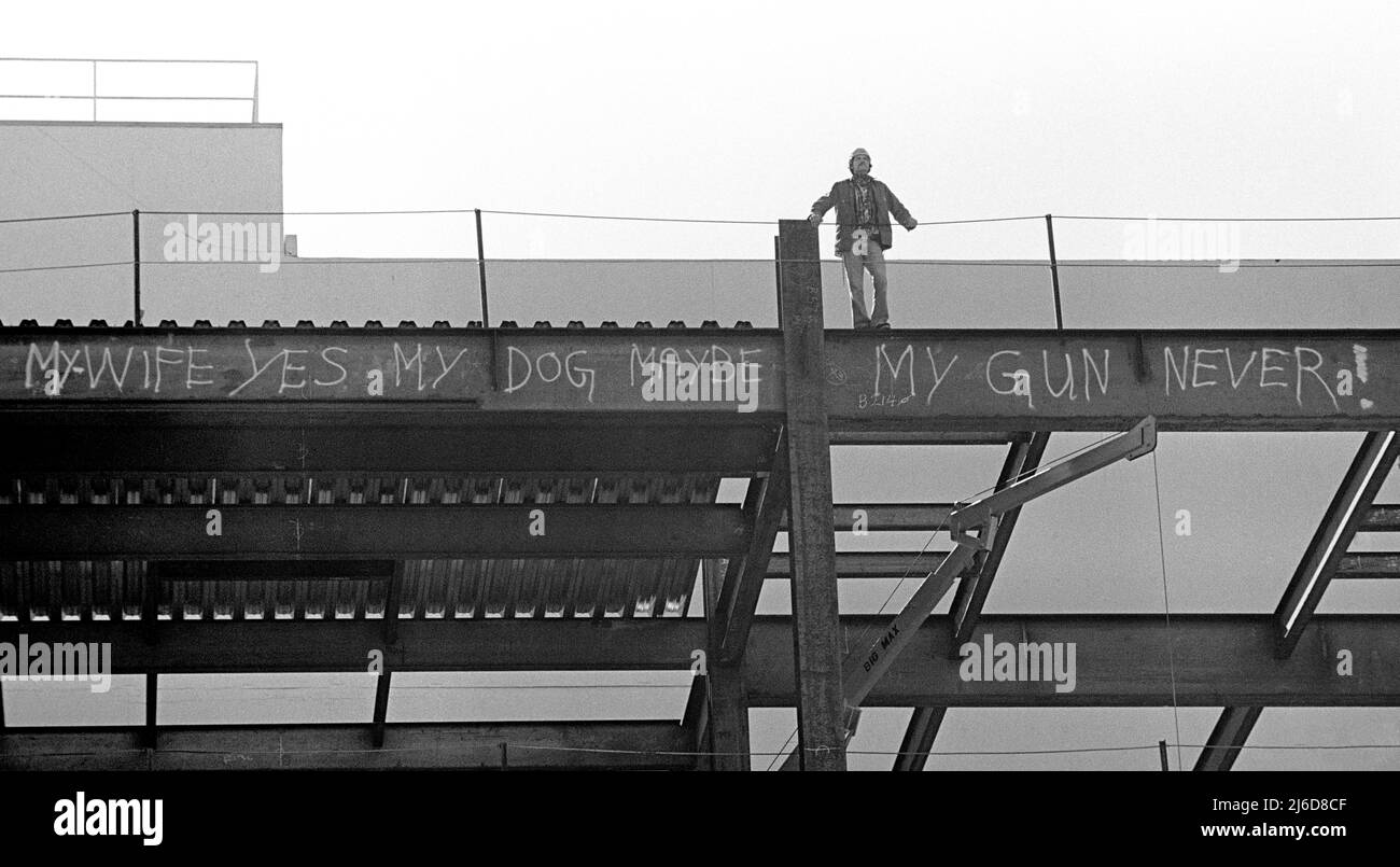 my wife yes my Dog maybe My gun Never! Pro gun message written on a steel beam on a building under construction in San Francisco, California Stock Photo